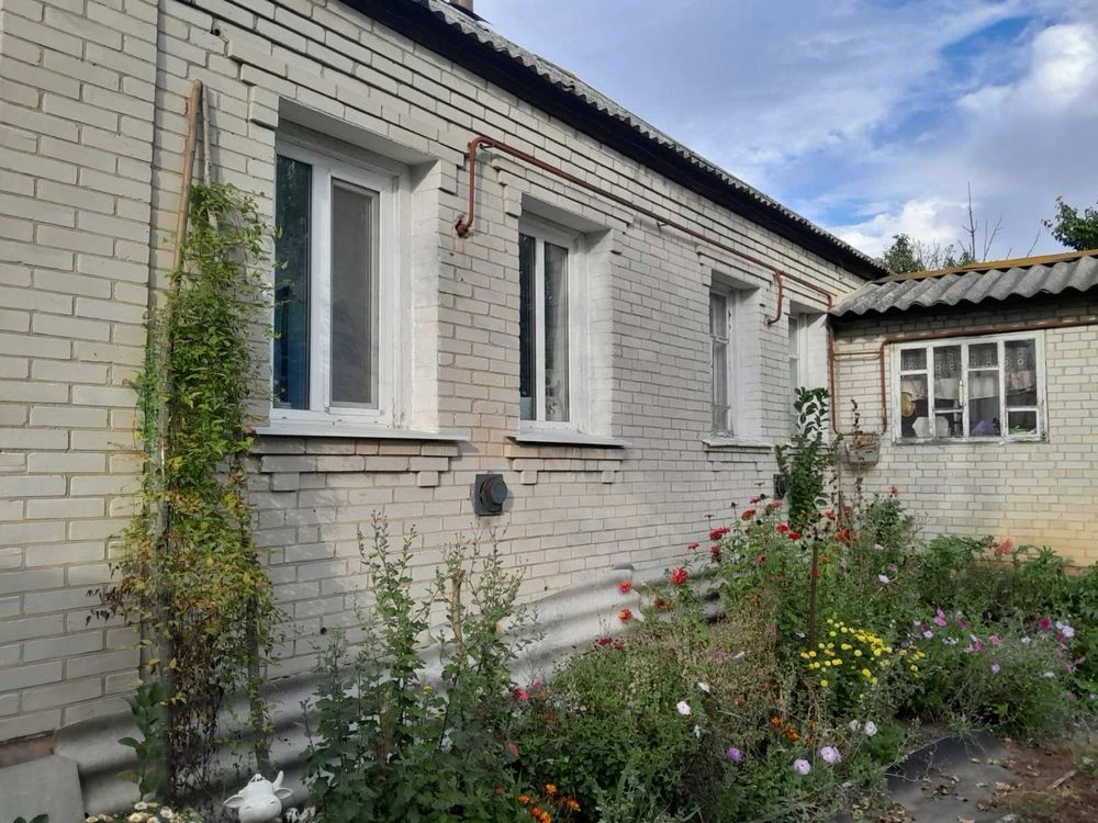 Urgent! House and apartment for sale in the town of Bilopolya