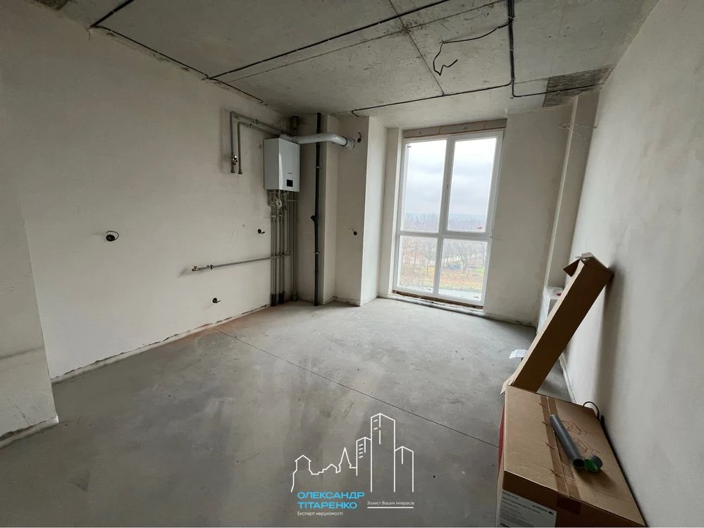 Spacious apartment with improvements in a completed building!