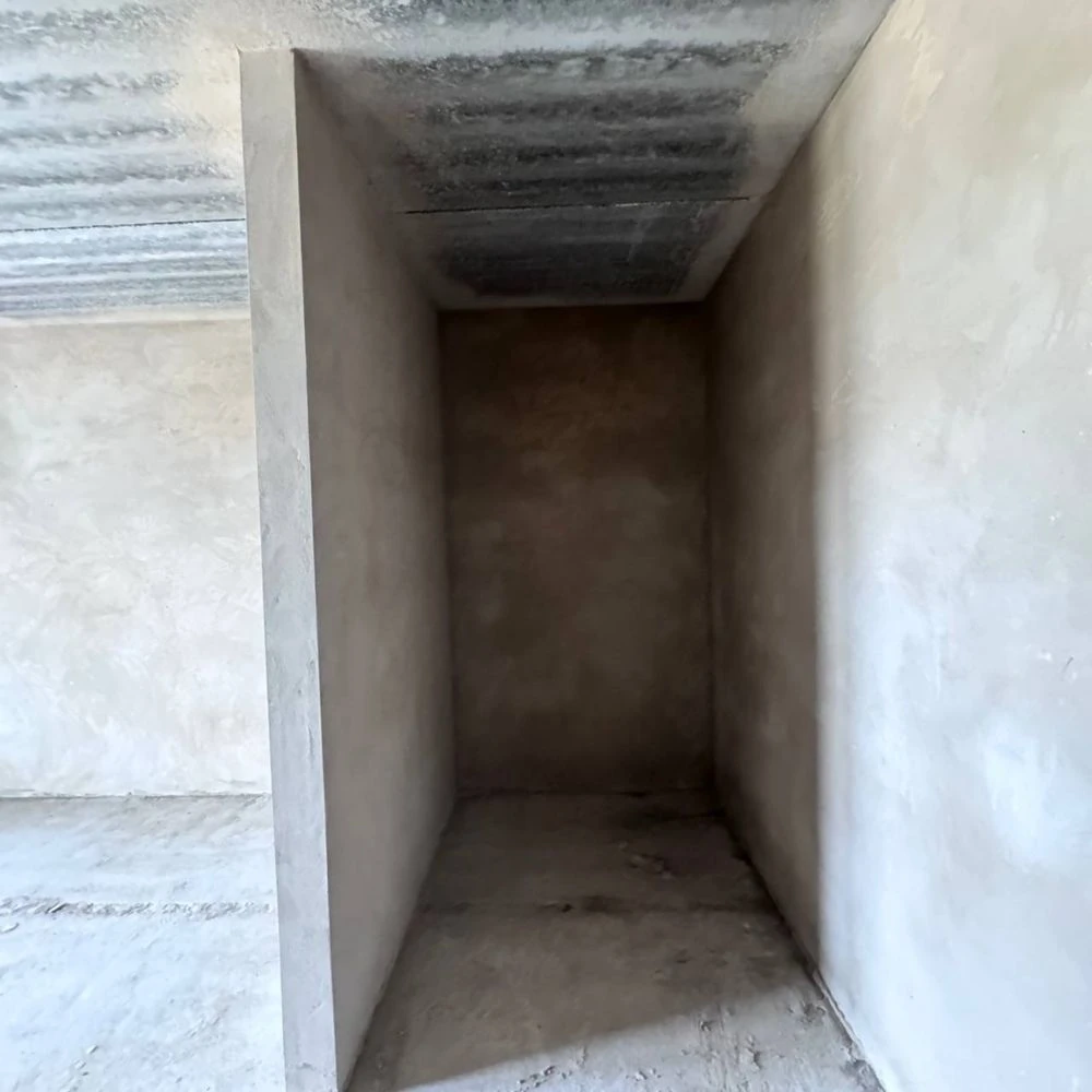 Spacious apartment with unfinished interior in a completed building,