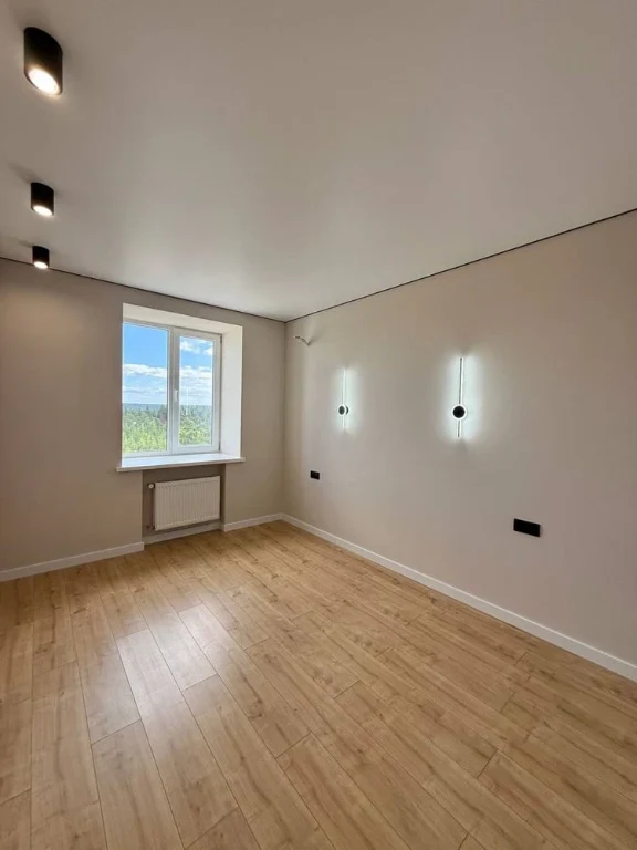 One-bedroom apartment with new renovation and view of pine forest