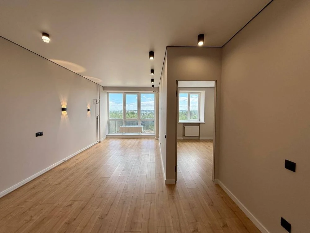 One-bedroom apartment with new renovation and view of pine forest