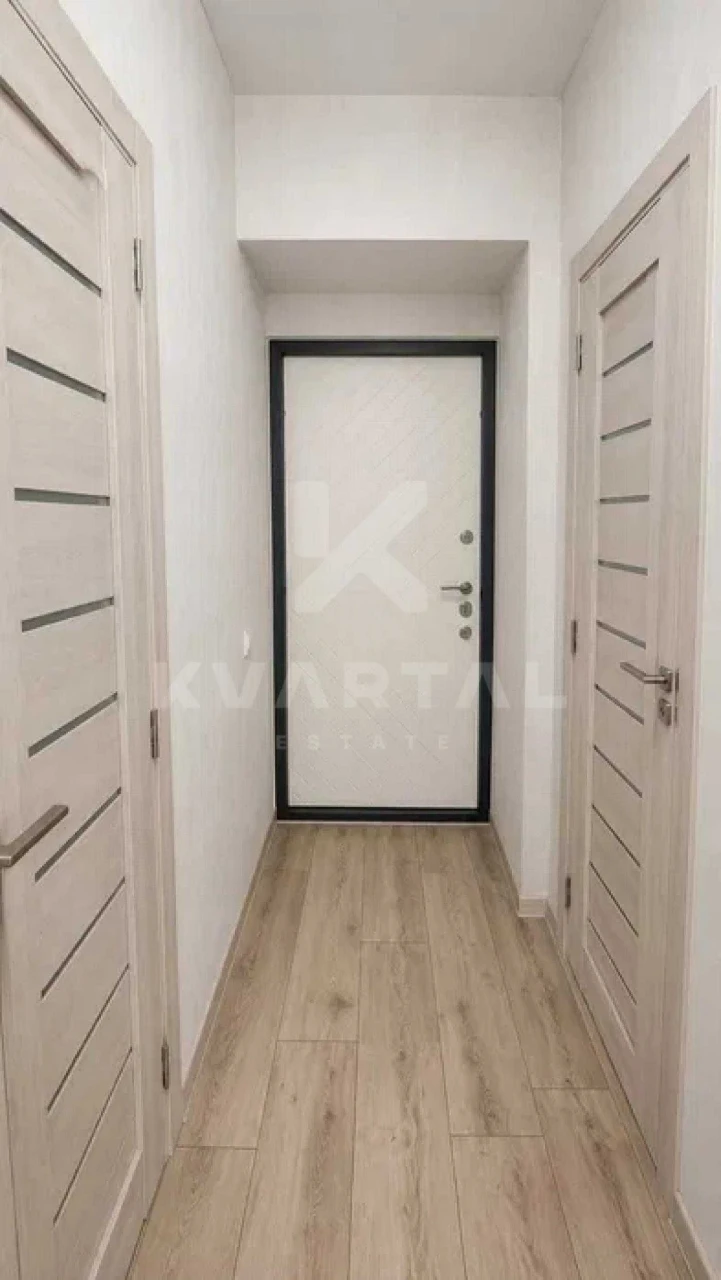 Sale of a 2-room apartment with stylish renovation and combined kitchen-living room