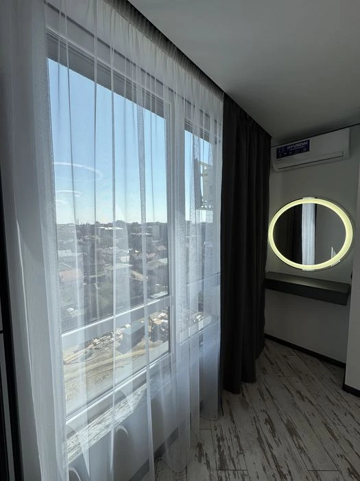 I am selling a stylish 1K apartment in the center of the Family Plaza residential complex