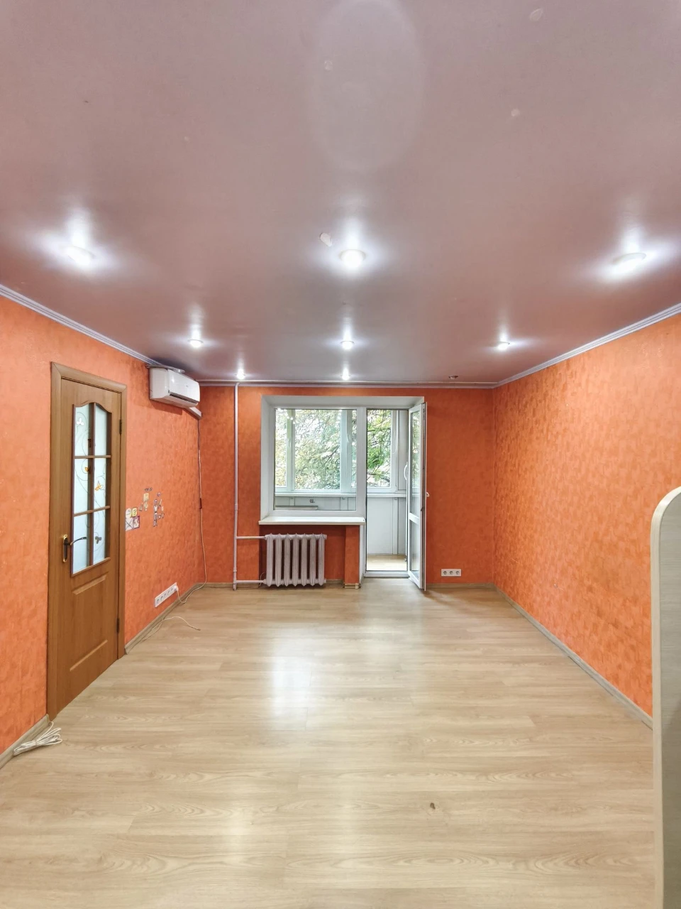 Center. One-bedroom apartment needing only wallpapering