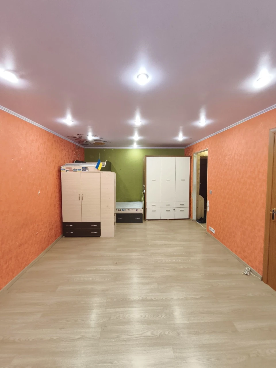 Center. One-bedroom apartment needing only wallpapering