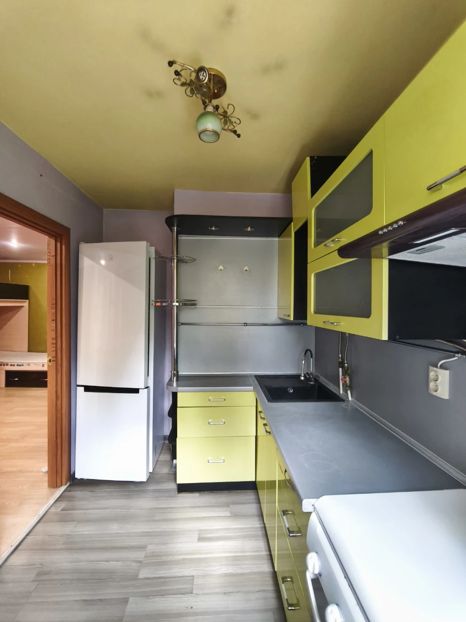 Center. One-bedroom apartment needing only wallpapering
