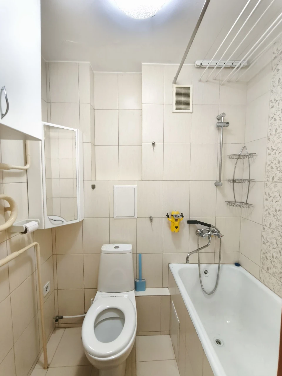Center. One-bedroom apartment needing only wallpapering