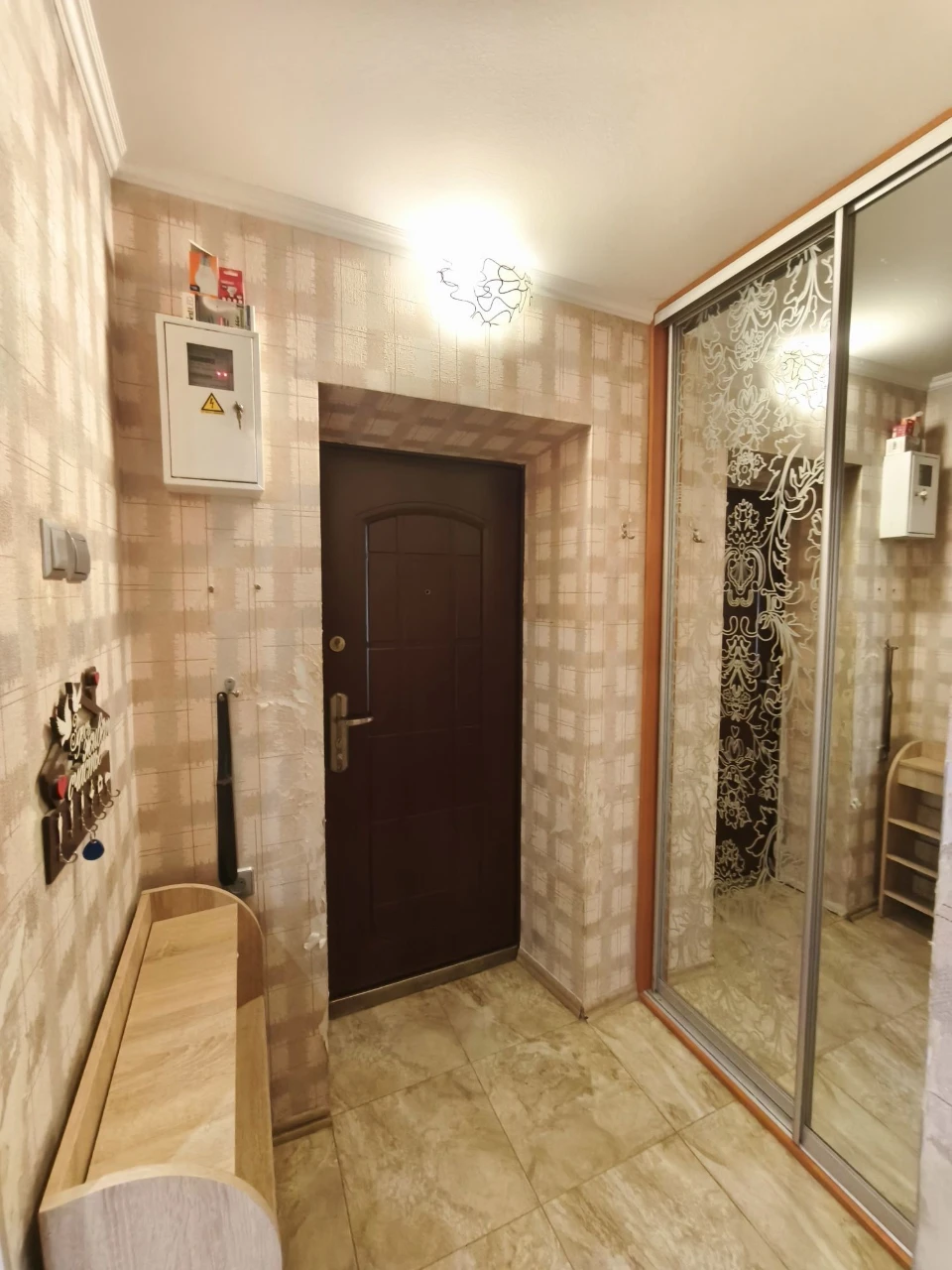 Center. One-bedroom apartment needing only wallpapering
