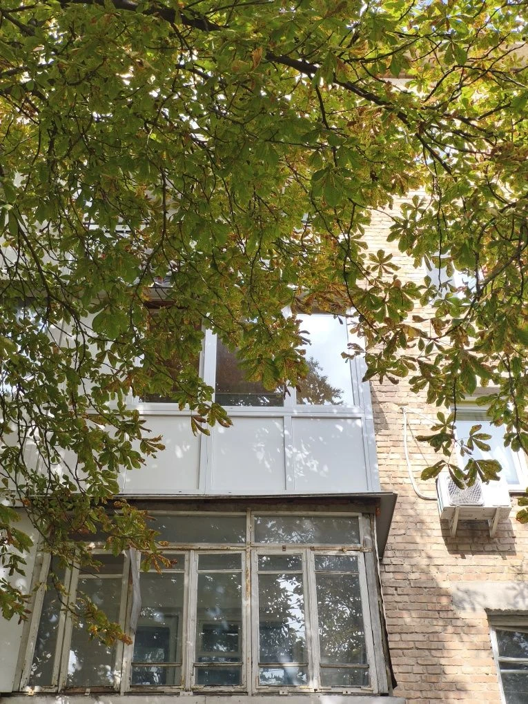 Center. One-bedroom apartment needing only wallpapering