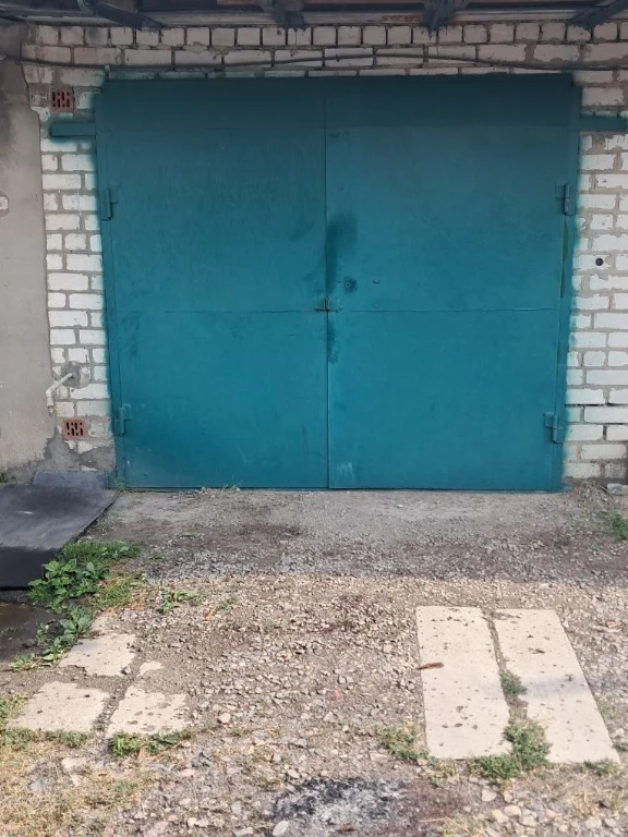 For Sale: Garage, Apartment, and Shelter Combo