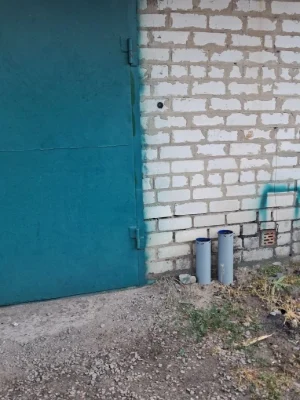For Sale: Garage, Apartment, and Shelter Combo