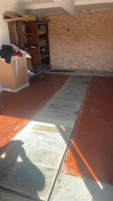 Garage in the city center with documents.