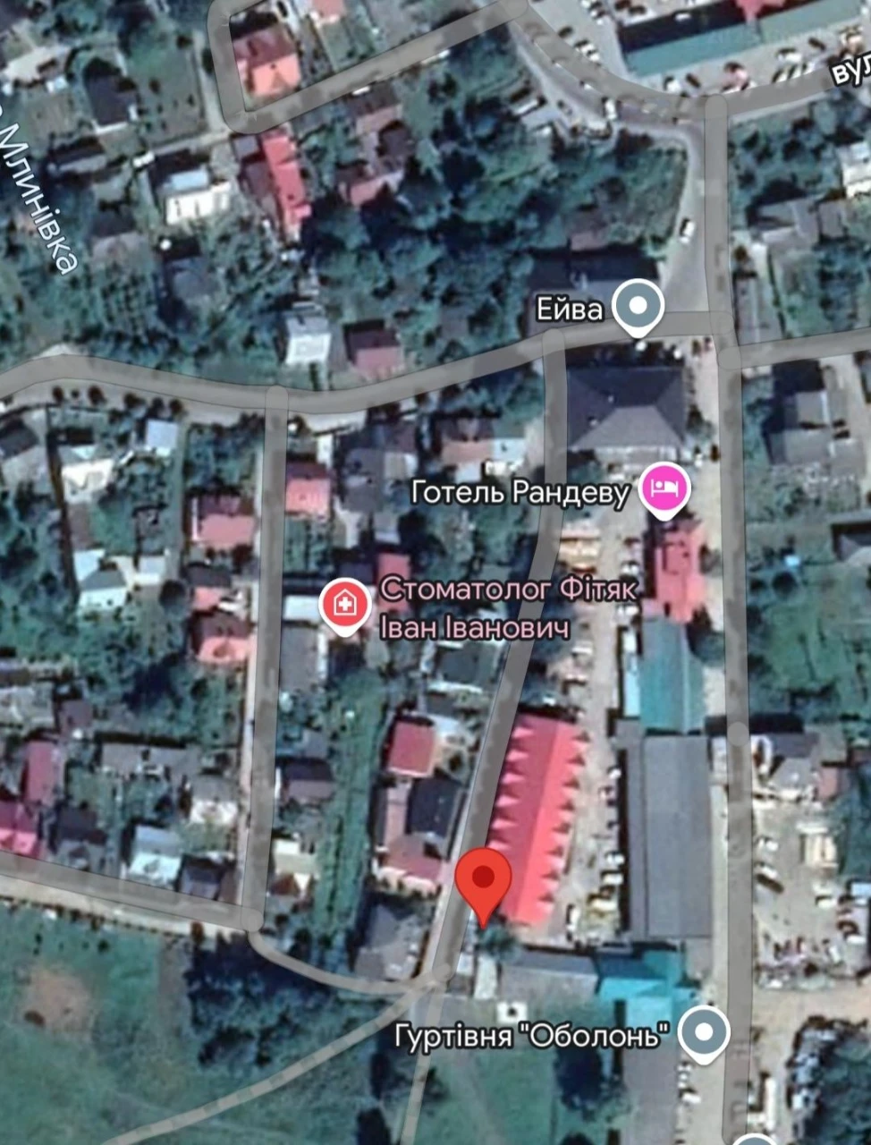 For sale: Garage and land