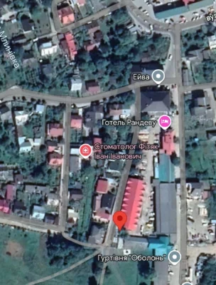For sale: Garage and land