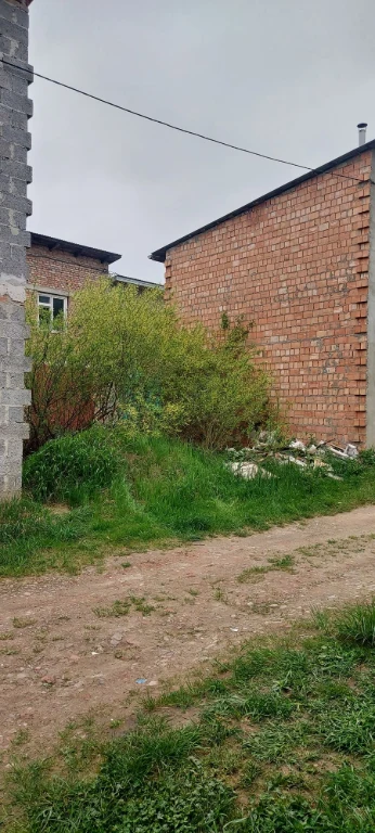 Land with foundation for garage