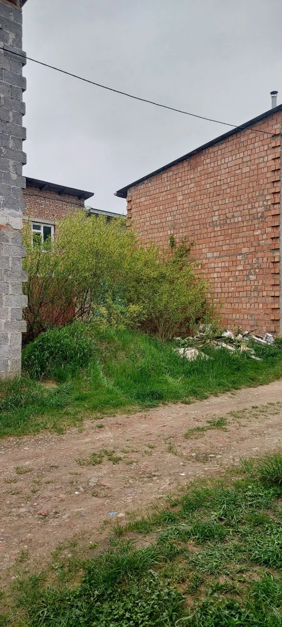 Land with foundation for garage