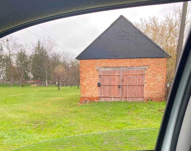 For Sale: Garage and Land Plot