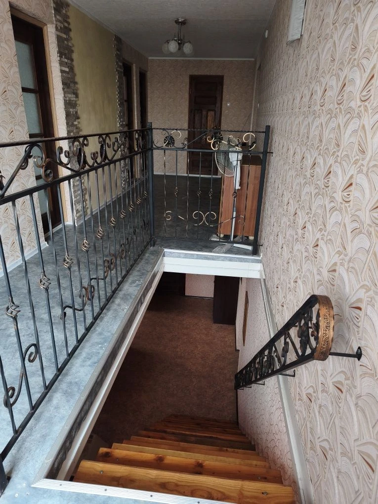Продам  будинок  в Новомиколаївкі  з  неймовірним планування