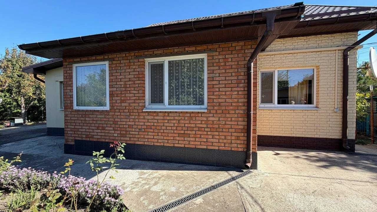 Продаж доглянутого будинку на Довгинцево, ділянка 10 соток