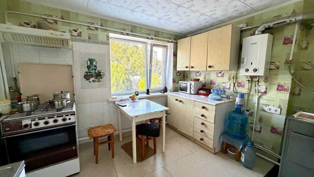 Продаж доглянутого будинку на Довгинцево, ділянка 10 соток