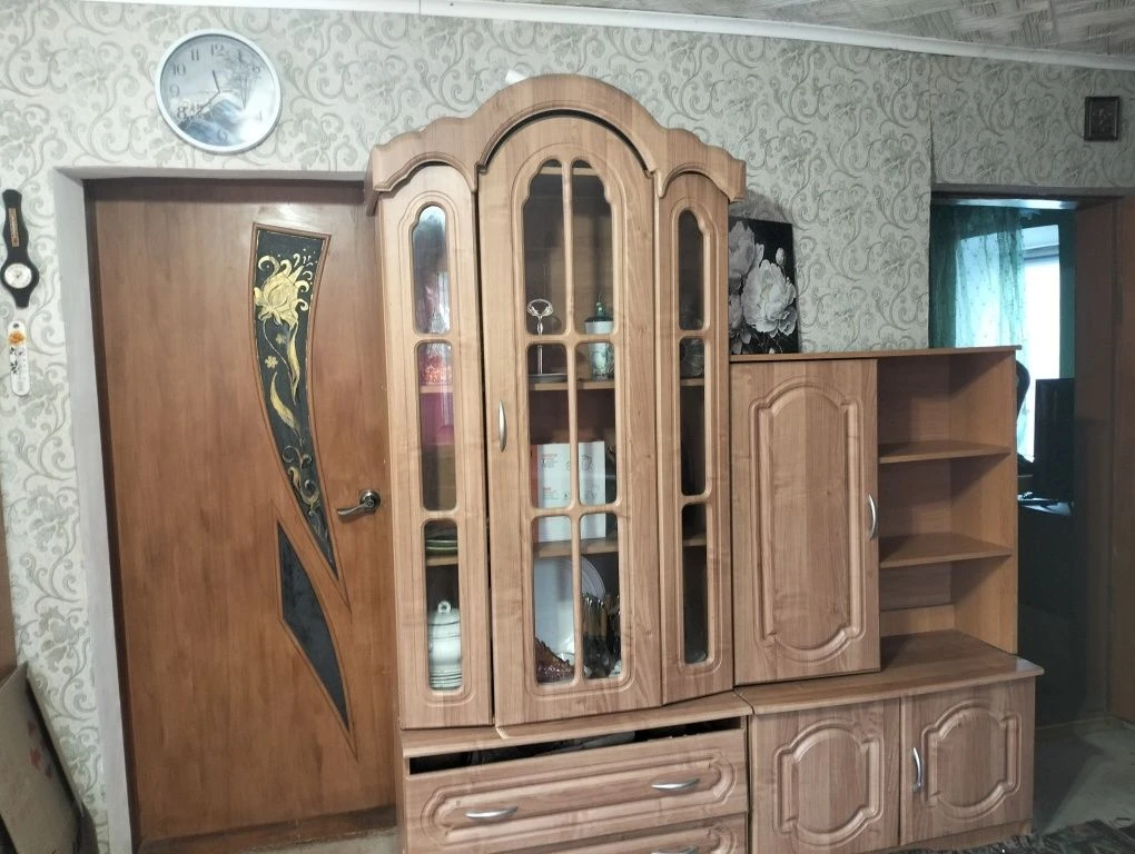 Продам 2 части дома с общим двором и участком 10 соток в Цен