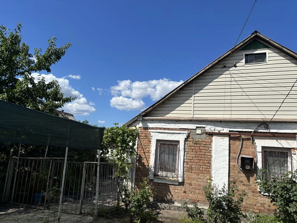 For Sale: House with a 10-Acre Plot in Metelopolysk
