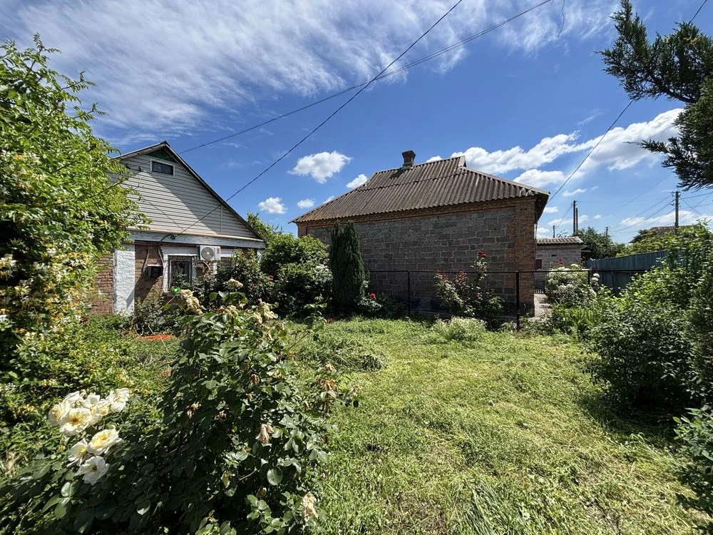 For Sale: House with a 10-Acre Plot in Metelopolysk