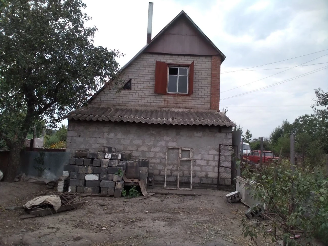Дом на Николаевском шоссе у реки