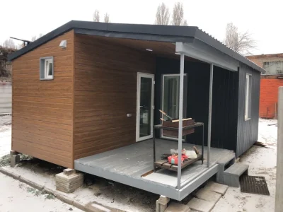 Модульний будинок з каміном.