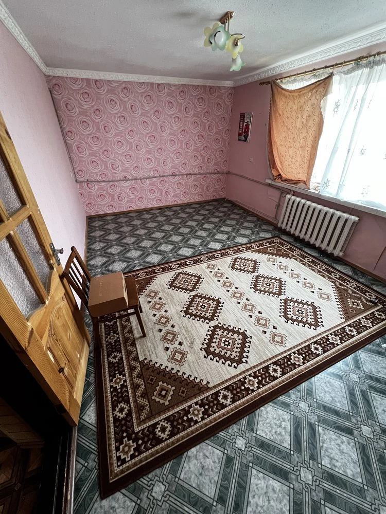 Двоповерховий будинок.