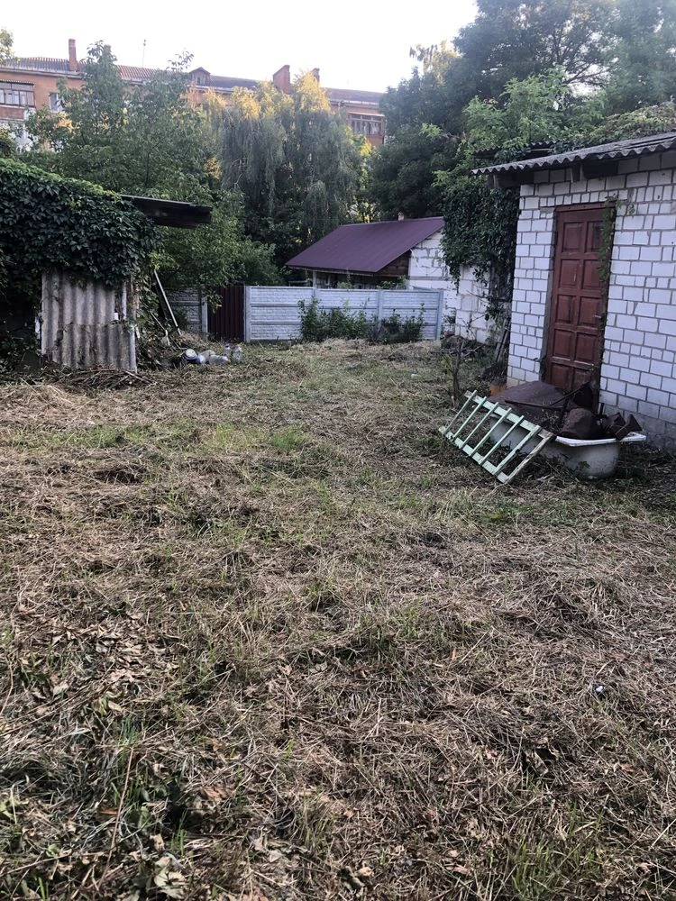 Old house with a plot.