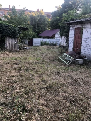 Old house with a plot.