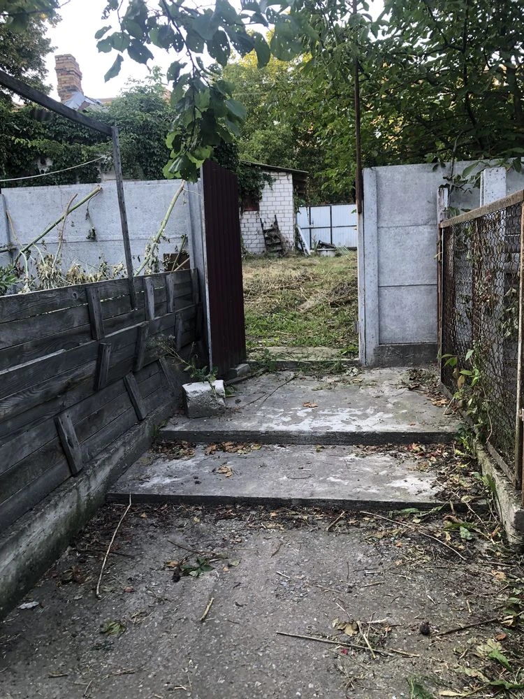 Old house with a plot.
