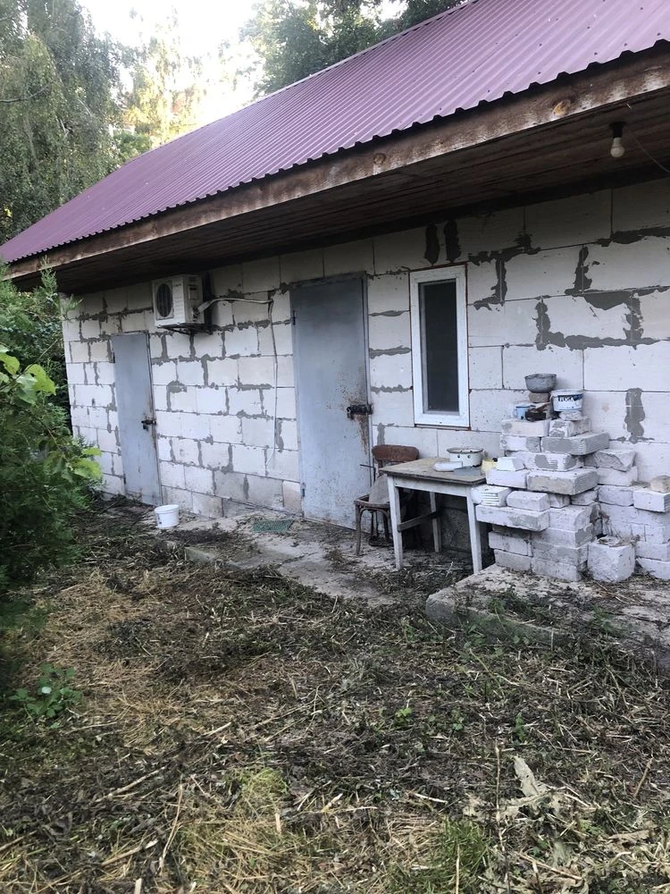 Old house with a plot.