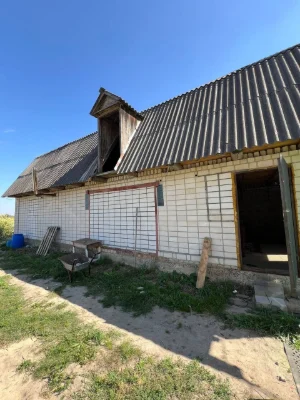 House near the forest in the village of Osikov