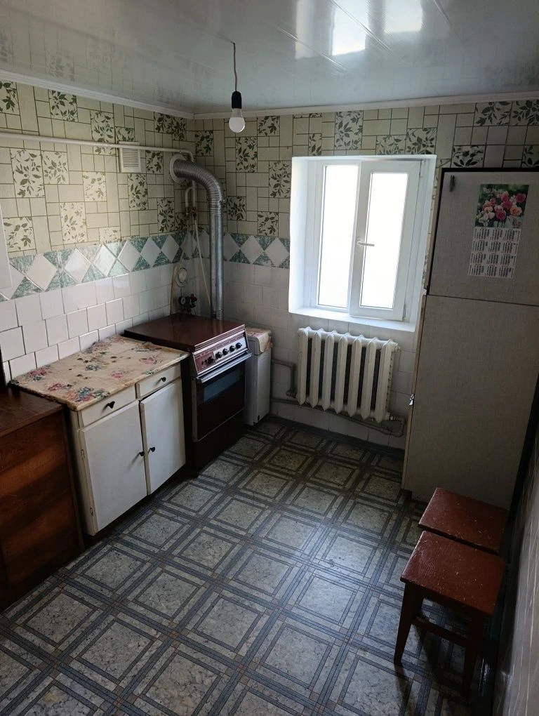 Продаю пів будинку  в Центрі  міста (поблизу податкової), ро