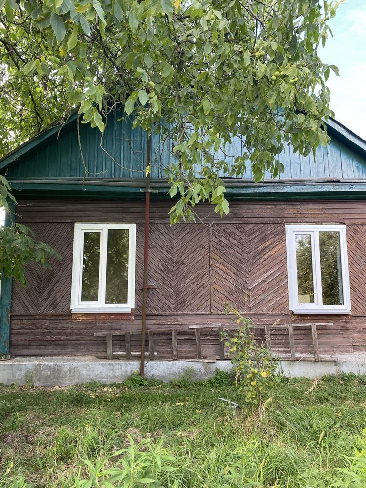 Продам пів будинку в м.Малин