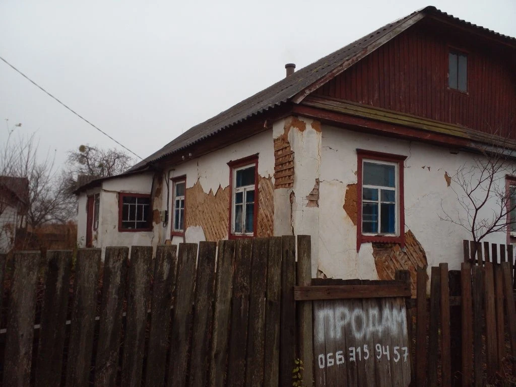 Продаж пів будинку в м.Малин