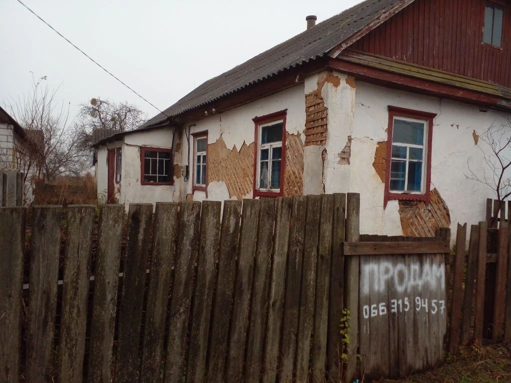 Продаж пів будинку в м.Малин