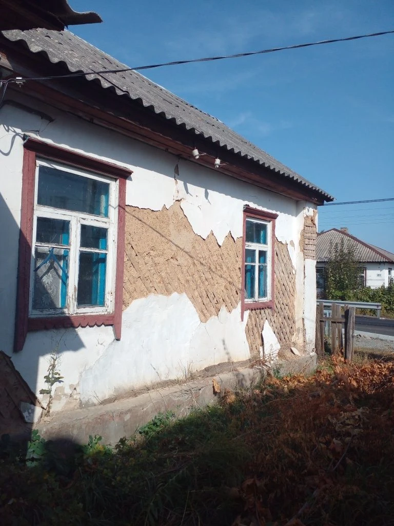 Продаж пів будинку в м.Малин