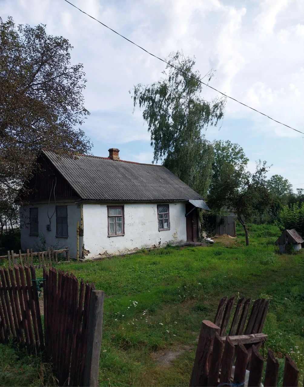 Будинок- земельна ділянка