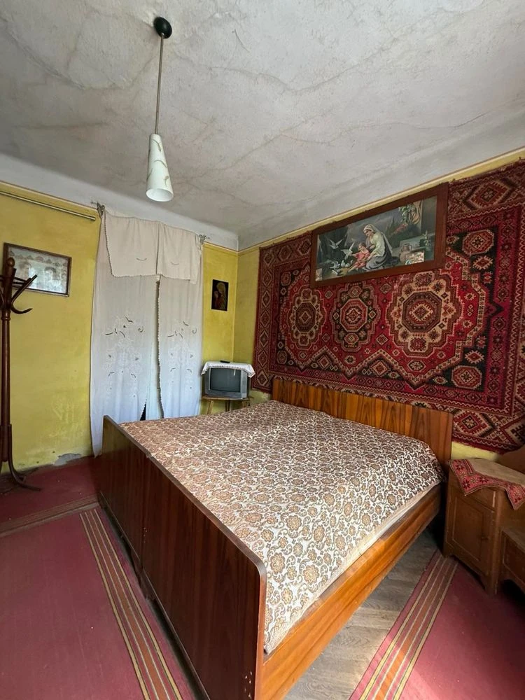 продаж цегляного будинку в Калуші