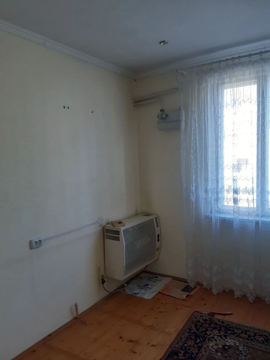 Двоповерховий будинок