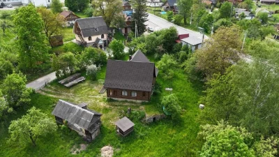 Триповерховий мансардний будинок в Яремче 240 м²