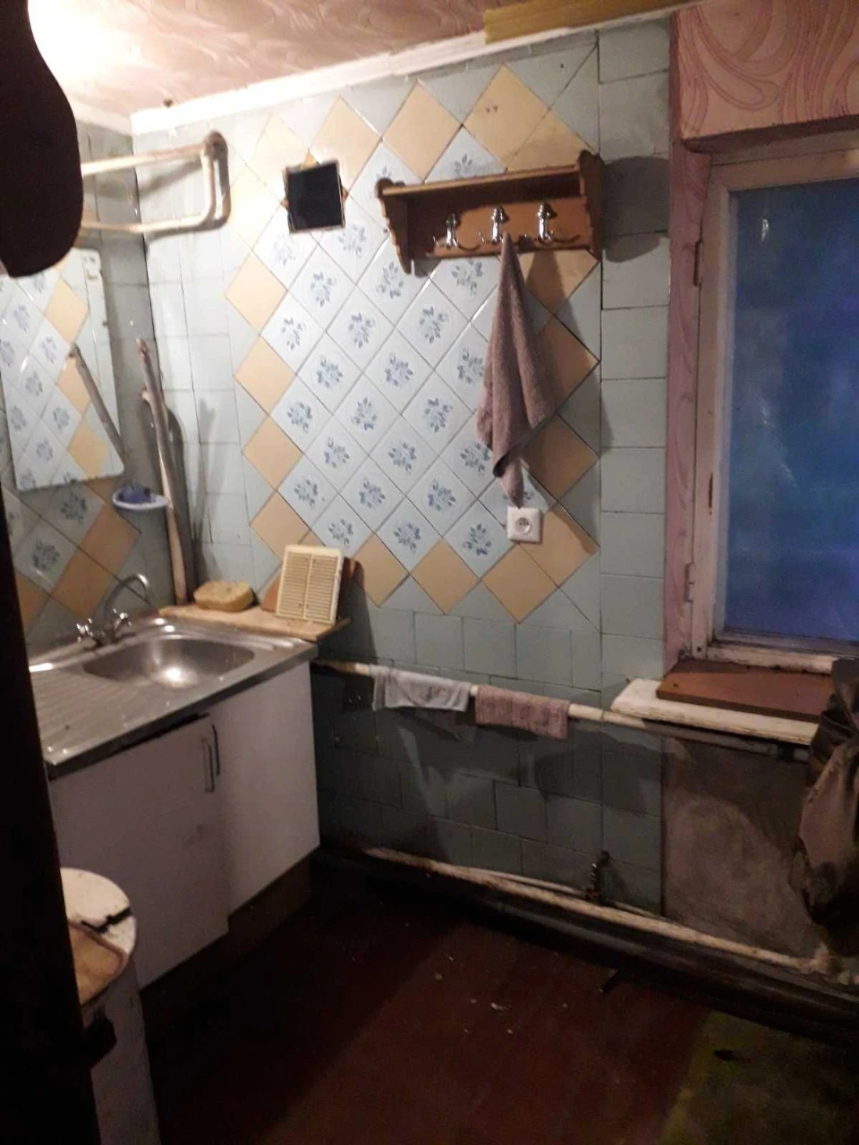 будинок у місті з великою ділянкою