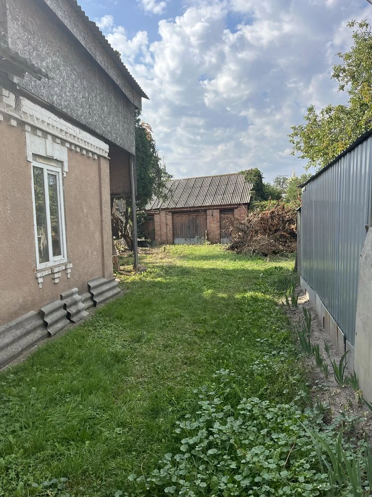 Selling half a house in the Center!