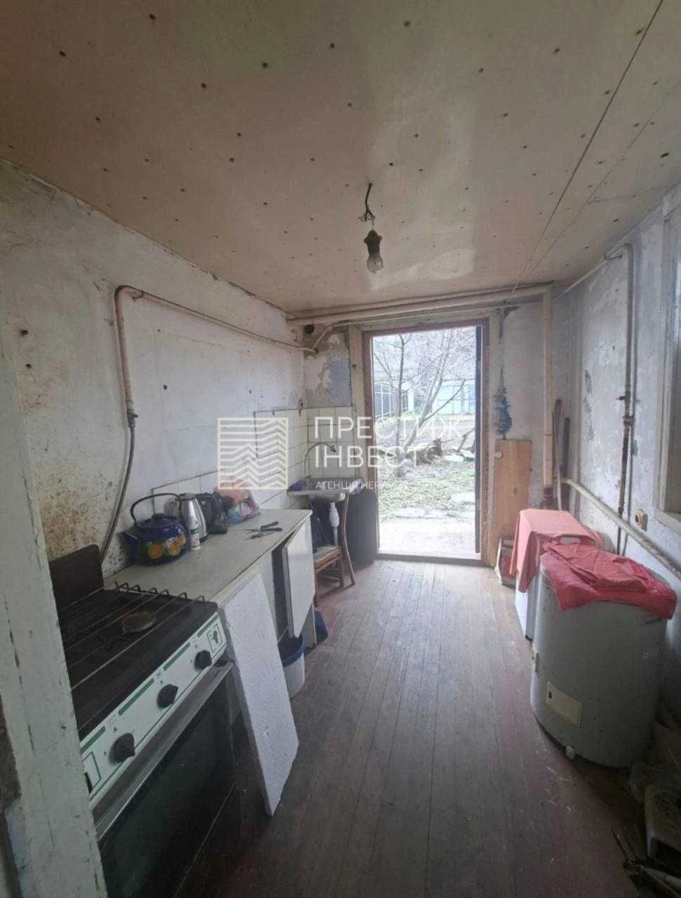 Sale of half a house on a 5-acre plot