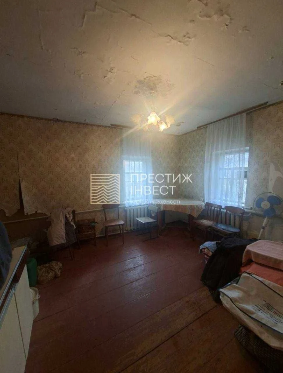 Sale of half a house on a 5-acre plot