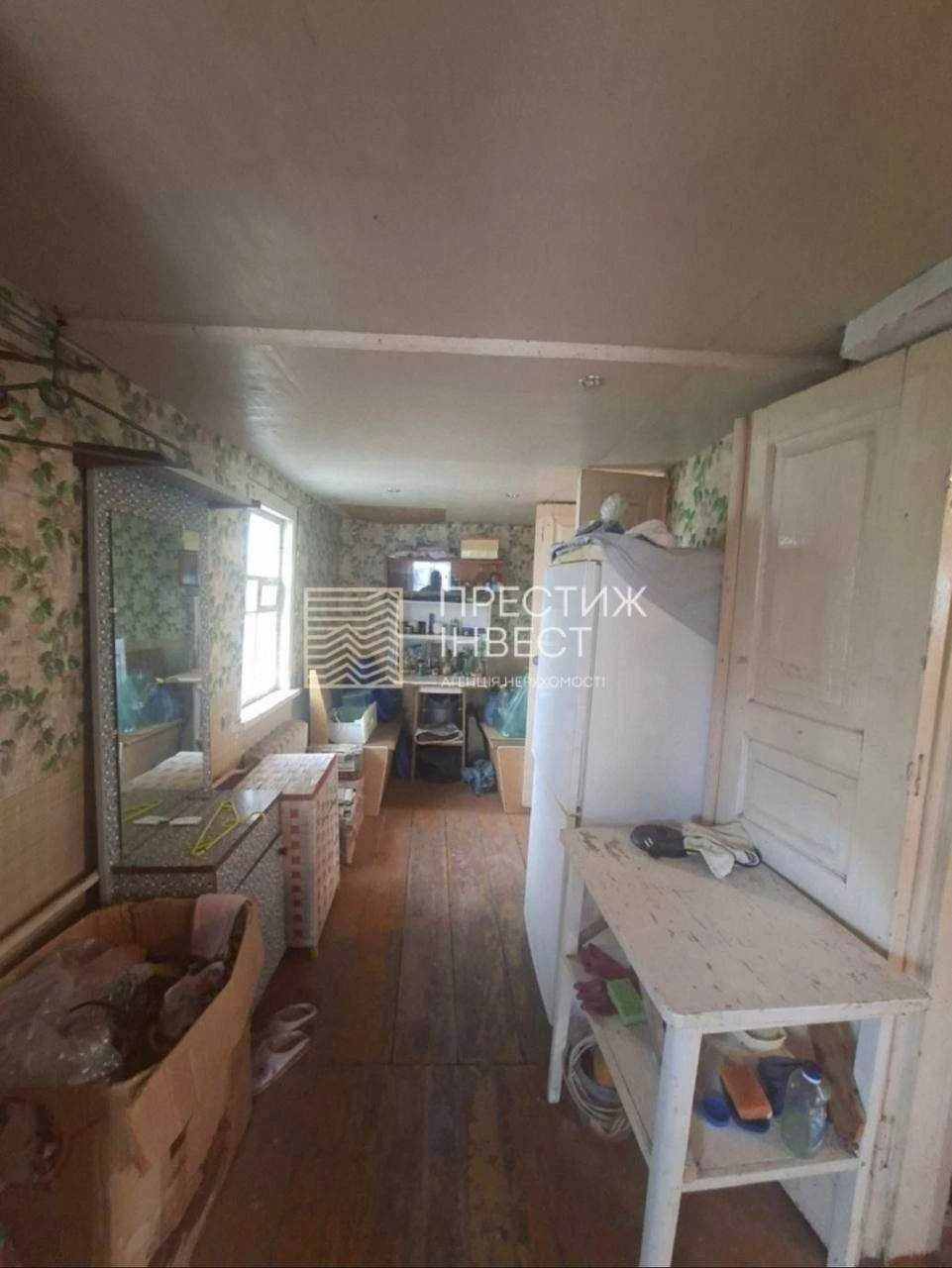 Sale of half a house on a 5-acre plot