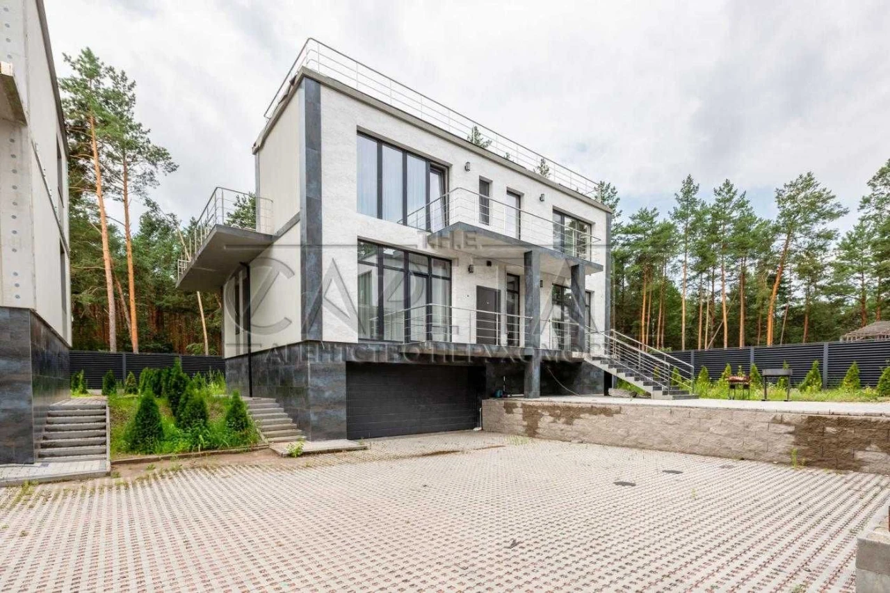 Сучасний будинок преміум-класу 400 м² з басейном та панорамн